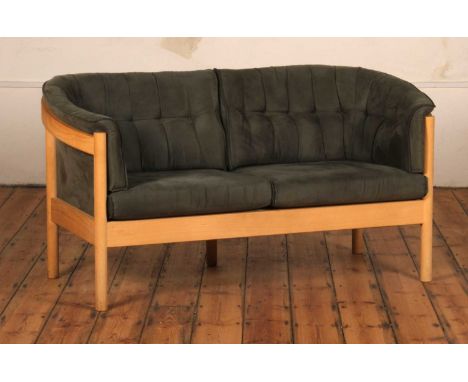A Danish Nielaus and Jeki beech framed green upholstered two seater sofaw.150cm