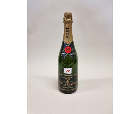 A 75cl bottle of Moet &amp; Chandon 'Dry Imperial' 1981 vintage champagne. 