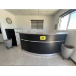 Semicircular reception desk in melamine refinements, measures approximately 2.20 x 1.10 x 2.00 mete