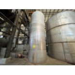 Stainless steel storage tank with a capacity of 38,000 liters, measuring approximately 2.80 meters