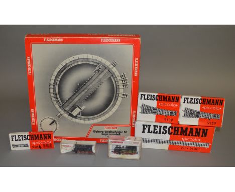 N Gauge. A group of boxed Fleischmann railway items including 2&nbsp; Locomotives - #7033 2-6-0&nbsp; and&nbsp; #9153 0-6-0, 