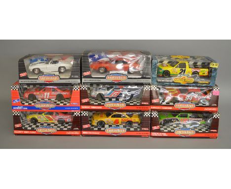 9 boxed ERTL 1:18 scale diecast model cars from their 'American Muscle' range including 1963 Corvette Sting Ray and 1969 Char