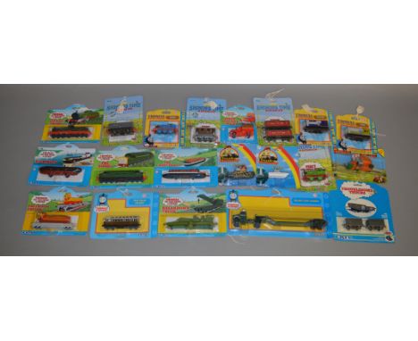 17 Thomas The Tank Engine diecast models by Ertl, also includes The Little Red Tractor and Tugboat (20).