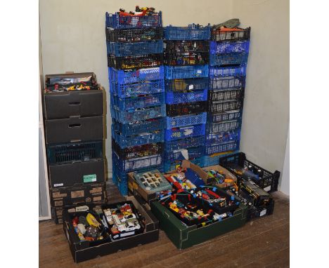 A very good quantity of unboxed playworn diecast models by various manufacturers, in a variety of different scales contained 