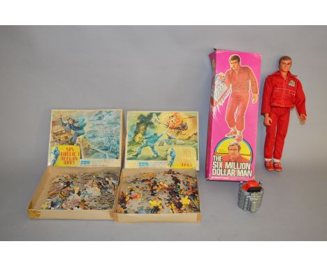 A boxed vintage Denys Fisher&nbsp; 'Six Million Dollar Man' 12 inch Action Figure dressed in red suit and comes with 'Engine 
