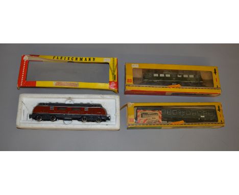 HO Gauge. 2 boxed Fleischmann Diesel Locomotives, #1379 Shunter and #4230 DB BR 212 both appear G/G+ in G boxes together with