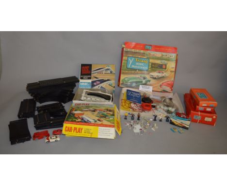 A boxed Tri-ang Minic Motorways M1576 Ferrari 500 SF together with two unboxed cars and the body of a Fire Engine together wi