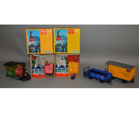 G Gauge. An unboxed Lehmann Lake George &amp; Boulder 0-4-0 Locomotive a Van and a Wagon together with two boxed Lehmann Rigi
