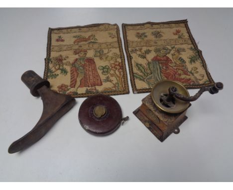 A tray of antique cast iron cobbler's last, leather cased Chesterman tape measure, vintage coffee grinder, two hand stitched 