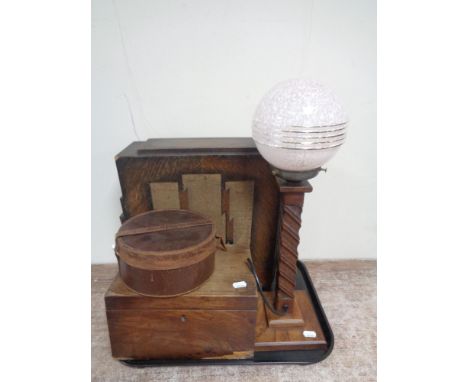 A tray of oak Art Deco table lamp with glass shade, leather collar box, oak Art Deco speaker, together with a Victorian mahog