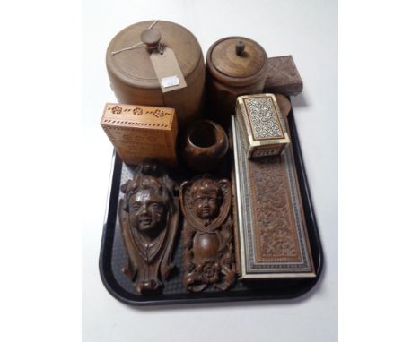 A tray of antique and later treen ware, lidded barrels, trinket boxes, cherub plaques etc 