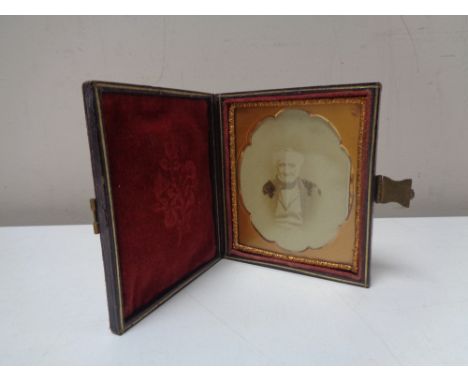 A Victorian daguerreotype portrait of a gentleman in a leather case 