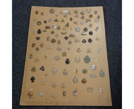 A collection of approximately 96 mostly First and Second World War cap badges 