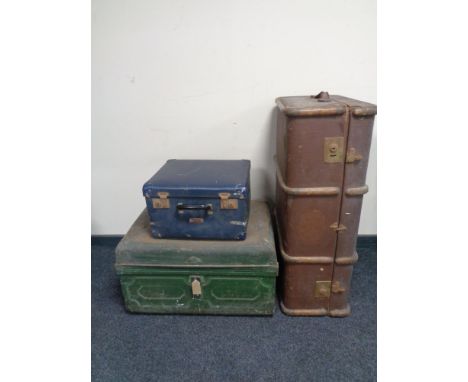 An early 20th century bentwood trunk together with a tin trunk and a Sky Chief luggage case 