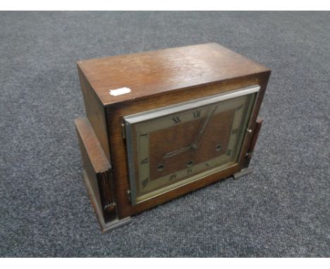 An oak cased Art Deco Coronet mantel clock 
