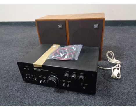 A Solarvox model SA2020 stereo amplifier together with a pair of Wharfedale teak cased speakers 