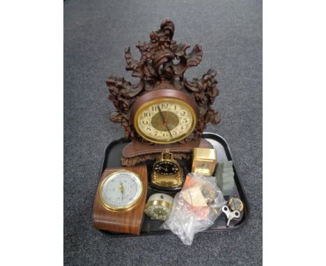 A tray of mid century barometer, assorted mantel and desk clocks, keys and winders 