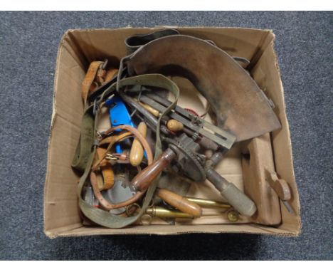 A box containing vintage hand tools to include woodworking plane, egg whisk, hand drill, brass syringes etc 