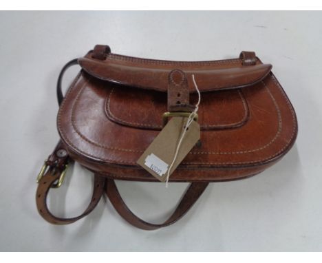 A vintage brown leather satchel bag 