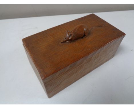 A Robert 'Mouseman' Thompson of Kilburn adzed oak lidded trinket box CONDITION REPORT: Good condition. 17cm by 9cm by 9cm. Ci