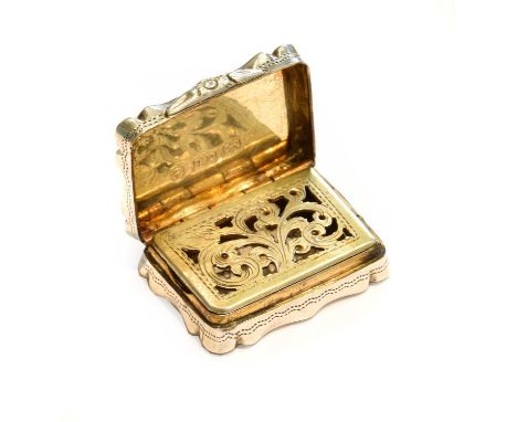 A Victorian Silver Vinaigrette, by David Pettifer, Birmingham, 1854, shaped oblong, the hinged cover engine-turned and centri