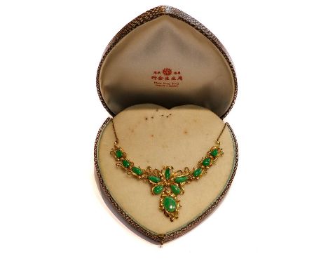 A jade type necklace, stamped '14K', length 41.5cmCondition report: The reverse of jade section stamped '14K', chain with app