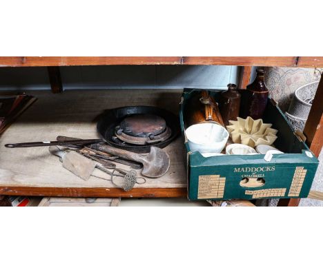 A quantity of 18th century and later kitchenalia including an iron skillet, toasting forks, pastry cutter, waffle iron, Avery