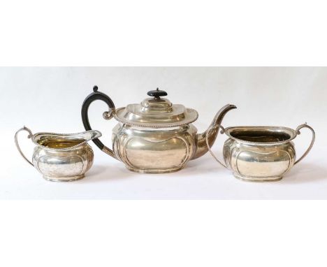 A Three-Piece George V Silver Tea-Service, by Harrison Brothers and Howson, London, 1913, each piece shaped oblong, with gadr