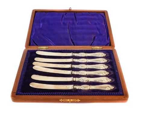 A Collection of Assorted Cased Sets of Flatware, including: four cased sets of six coffee-spoons, one set with sugar-tongs en