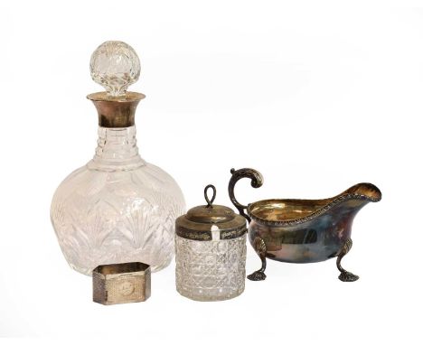 A Collection of Assorted Silver, comprising: a sauceboat; a napkin-ring; a silver-mounted cut-glass jar and cover and a silve