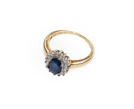 A sapphire and diamond cluster ring, finger size PCondition report: The marks are rubbed but in our opinion would test as gol