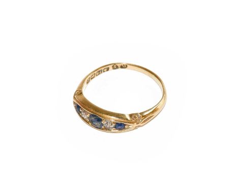 An 18 carat gold sapphire and diamond five stone ring, finger size PCondition report: The ring is in good to fair condition w