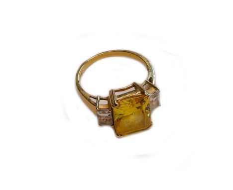 A 14 carat gold yellow beryl and white stone ring, finger size R1/2Condition report: Gross weight 7.0 grams.