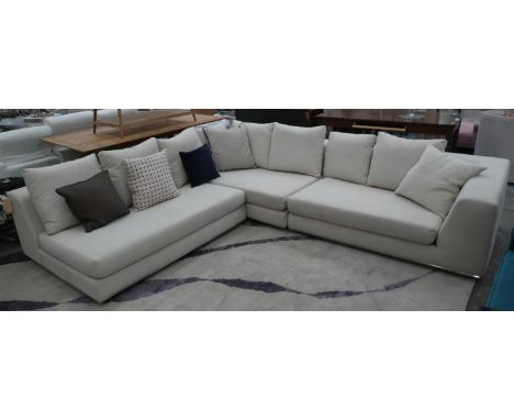 EICHHOLTZ CORNER SOFA, 316cm x 270cm x 80cm, with various scatter cushions. 