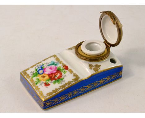 Limoges inkwell with blue and white ground and floral decoration. Stamped Marque Deposse and Rehausse Main to base.W: 6cm app