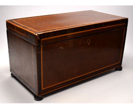 A satin wood box (tea caddy) with box edging, fitted and removable middle compartment, with 2 right and left compartments wit