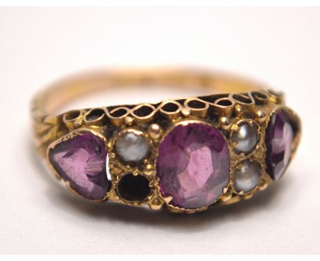 15ct amethyst and seed pearl ring. Size L. 1 seed pearl missing and one stone slightly looseGross weight approx 2.1g