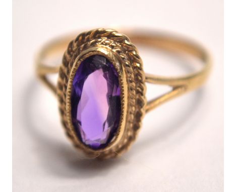 375 hallmarked amethyst oval shaped ring. Size NGross weight approx 2.1g