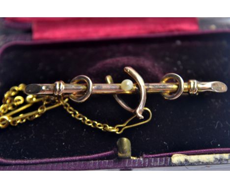 9ct bar brooch with wishbone and seed pearl. Signs of solder to pinW: 4.5cm approx Gross weight approx 2.3g