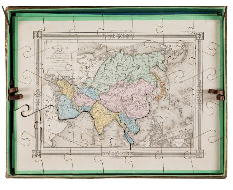 Puzzle Atlas.- Boxed set of eight jigsaw puzzle maps of the world, engraved maps with hand-colouring, laid down to wood and r