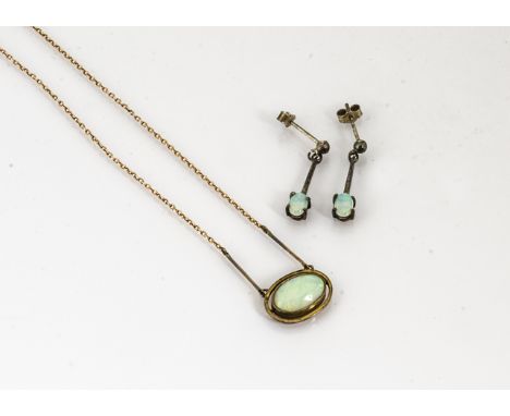 An opal drop pendant and gold chain, with matching opal drop earrings 