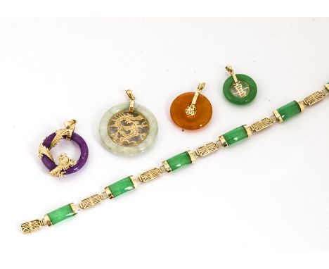 A quantity of coloured jade and hardstone Chinese pendants, and a green jade Chinese bracelet 