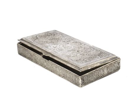 A vintage Persian silver box, rectangular having ornate engraved designs to lid and sides, 16cm and 317g 