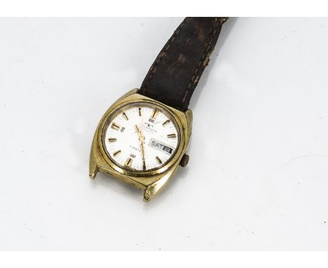 A c1960s Technos Automatic Pioneer gilt and stainless steel gentleman's wristwatch, 34mm case, silvered dial with day and dat