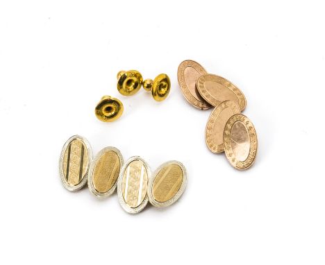 Two pairs of 9ct gold oval linked cufflinks, with engine turned decoration and a set of three gold studs, 14gRose gold exampl