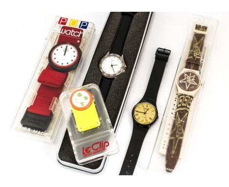 Three Swatch watches, including a black A83, strap damaged, another in box marked S446, and a Pop Swatch in box, together wit