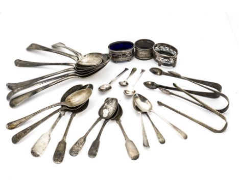 A collection of Georgian and later silver flatware, including tablespoons, teaspoons, small spoons, tongs, along with a pair 