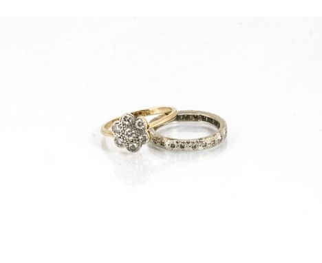 A diamond 18ct gold flower head ring, the old cut stones in millegrain setting in the form of a flower head, ring size L 1/2,