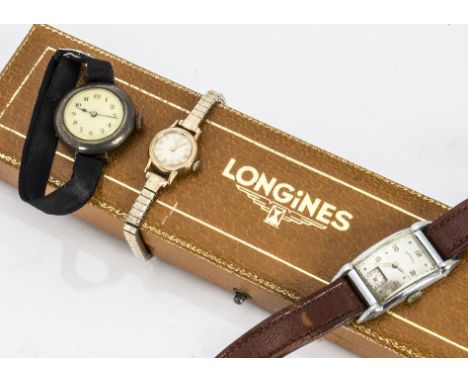 A 1960s Longines 9ct gold cased lady's wristwatch, on later expanding strap in a Longines long box, together with a silver tr