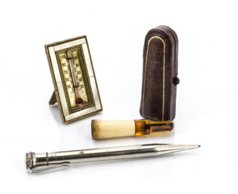 An amber and meerschaum cheroot holder, in fitted leather case, an EDAC Paris silver plated propelling pencil and a mid 20th 